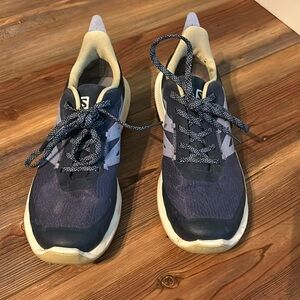 Salomon outpulse running shoes in blue